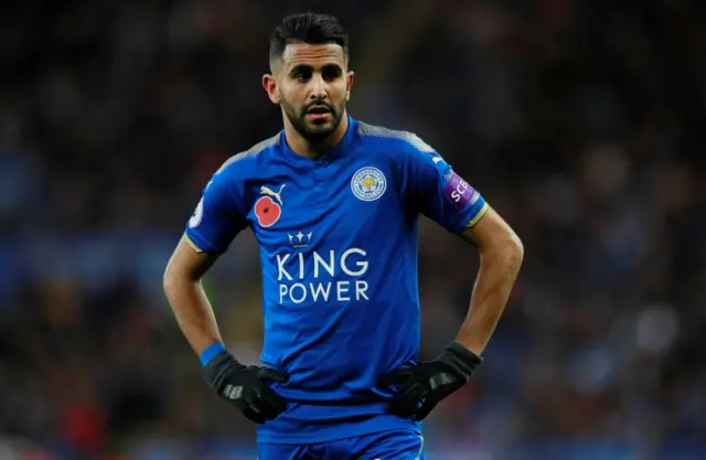 Leicester City's Riyad Mahrez stands with his hands on his hips