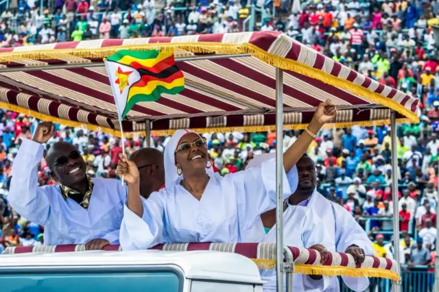 Grace Mugabe waves as she arrives to address Zimbabwean worshippers and congregants from various indigenous church denominations at a religious gathering rally organised by Zimbabwean ruling party Zimbabwe African National Union- Patriotic Front (Zanu PF) Harare Youth Province on November 5, 2017 in Harare