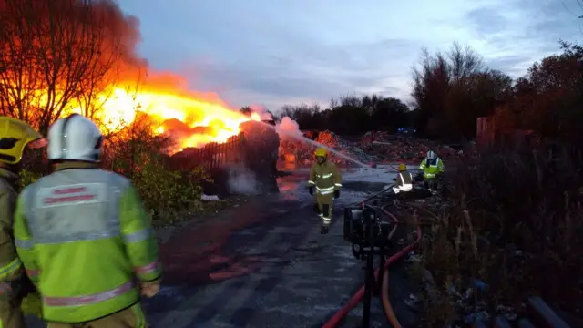 Fire crews at the site on Saturday