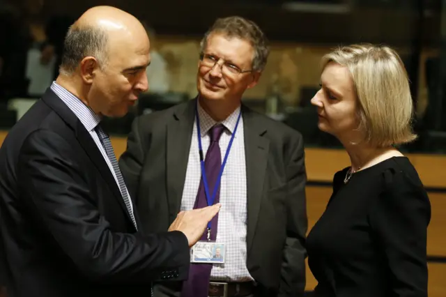 Pierre Moscovici talks to UK Treasure Secretary Liz Truss