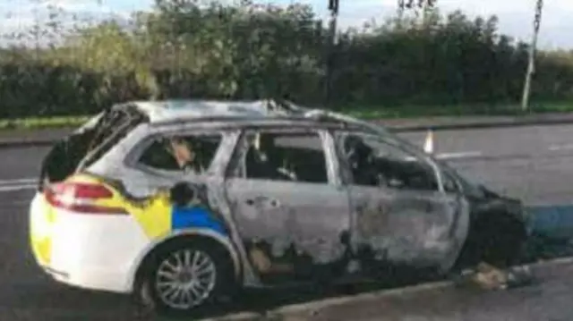 Police car torched