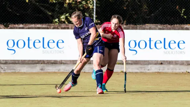 Lizzy Wheelhouse competes with an opposition player