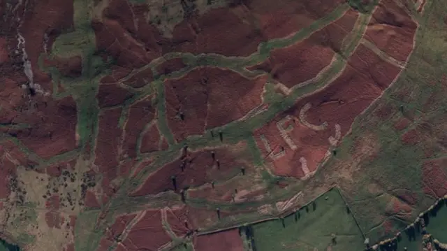 The letters on the side of Titterstone Clee Hill.