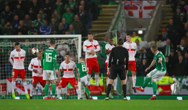 Chris Brunt hits a free kick