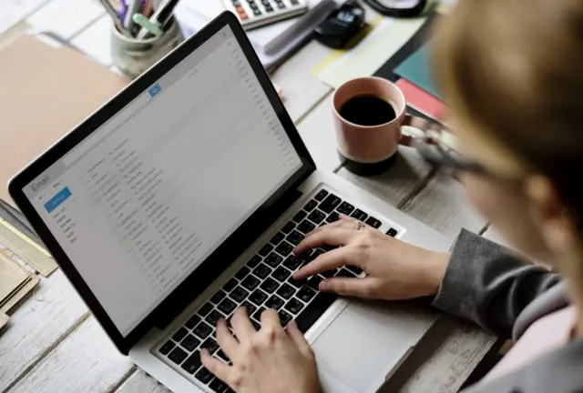 A woman checking emails