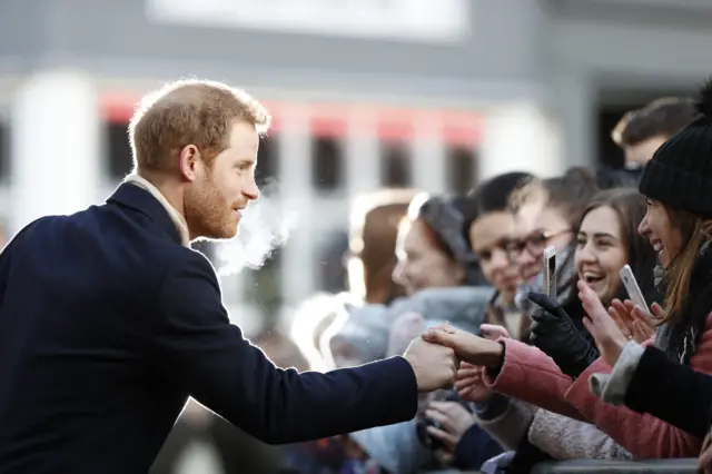 Prince Harry greeting well-wishers