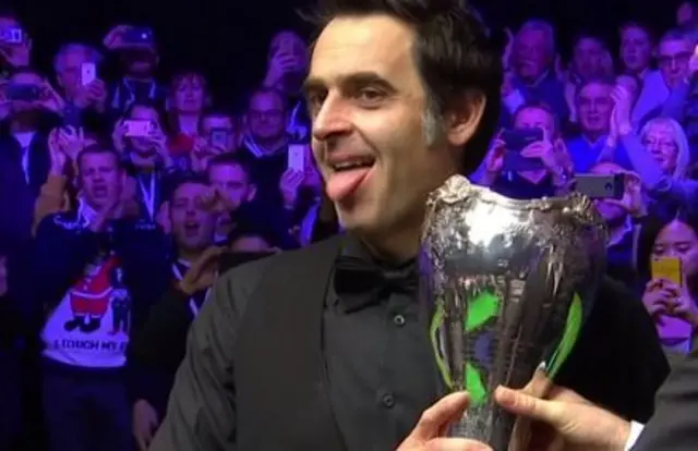 Ronnie O'Sullivan poses with the UK Championship trophy