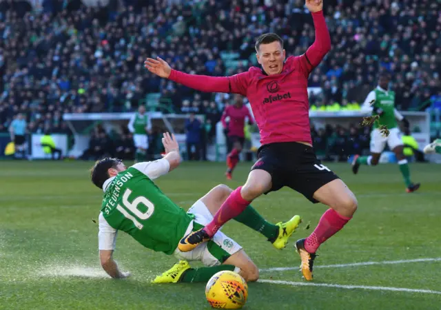 Lewis Stevenson gets a foot in to stop Callum McGregor