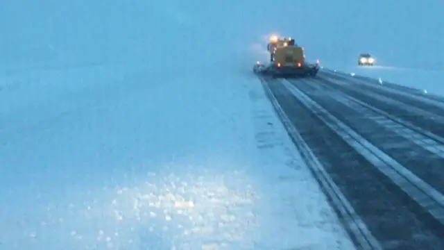 Runway at Birmingham Airport being cleared on Sunday