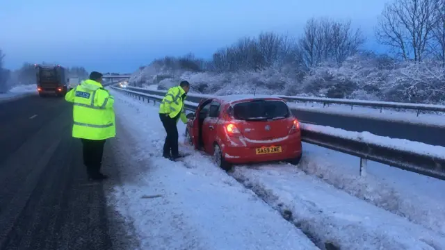 Driver on motorway in snow