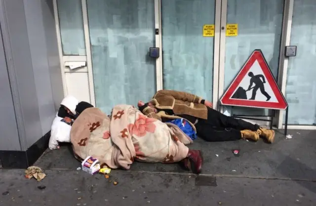 Rough sleepers on a street