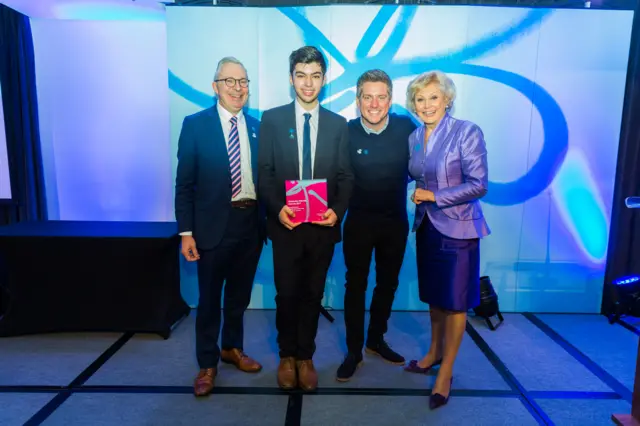 Winner: Kian Borg-Jackson pictured with Jeremy Hughes CEO of Alzheimer’s Society, actor Richard McCourt and Angela Rippon.
