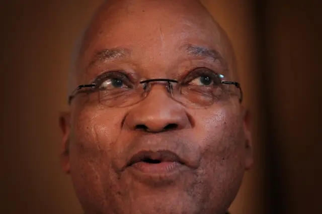 South African President Jacob Zuma talks to reporters inside Number 10 Downing Street on March 4, 2010