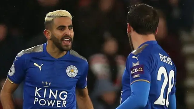 Riyad Mahrez celebrates with Christian Fuchs