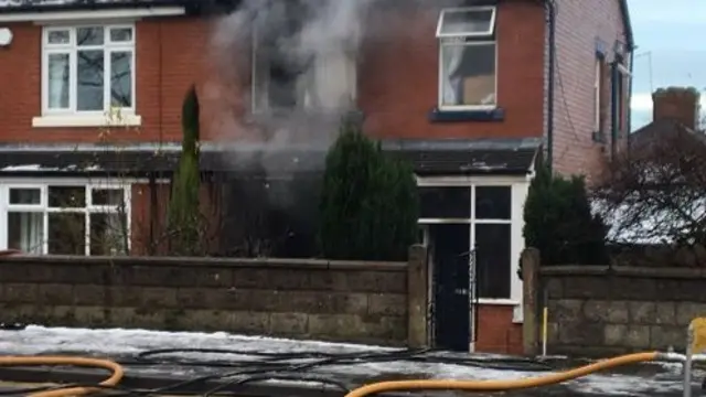 Smoke coming from front of house