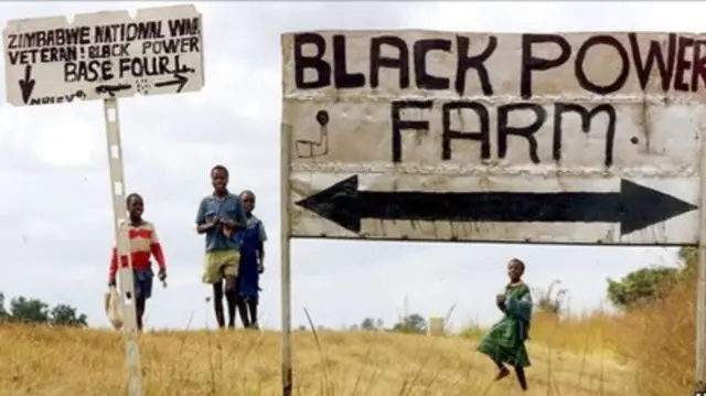 Sign post with the words black power