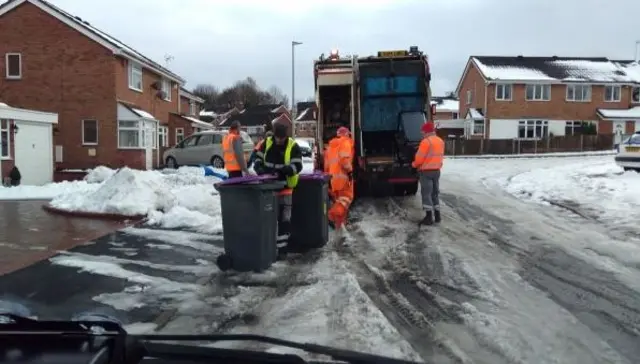 Binmen in snow