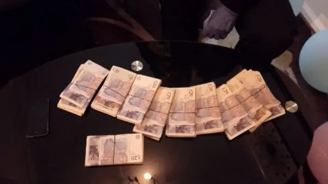 Seized cash on the table