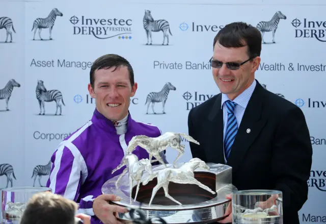 Aidan O'Brien celebrates training Wings Of Eagles to Epsom Derby victory with jockey Padraig Beggy