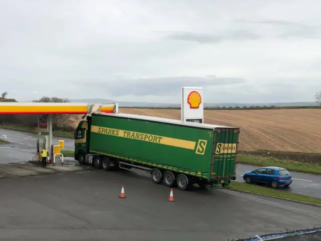 Lorry trapped in petrol station