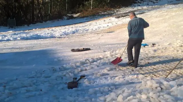 Snow and ice being cleared at centre