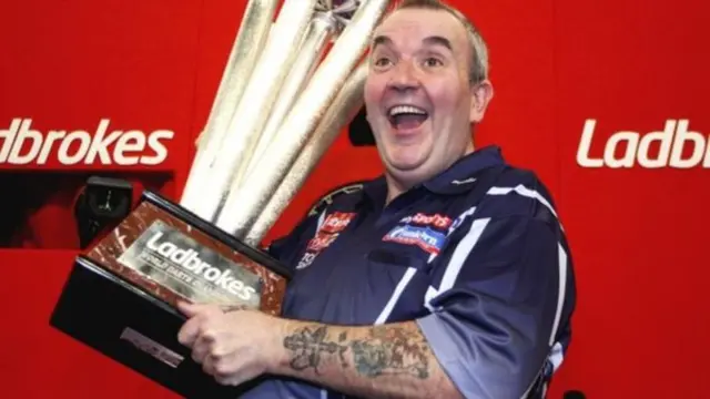 Phil Taylor with trophy