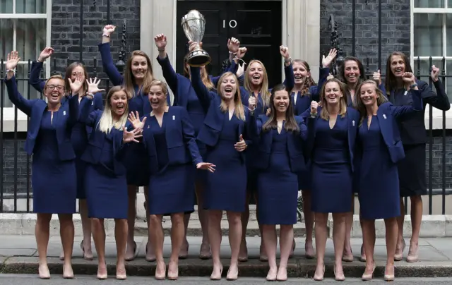 England women's cricket team pose with the World Cup trophy outside 10 Downing Street