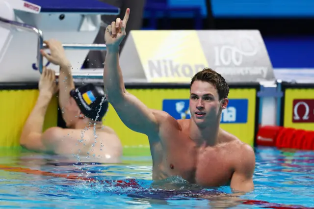 Ben Proud celebrates winning world 50m butterfly gold