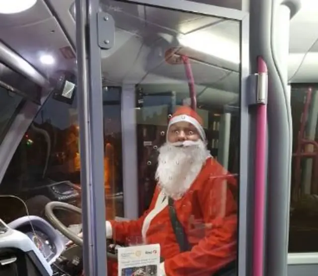 Santa driving First bus