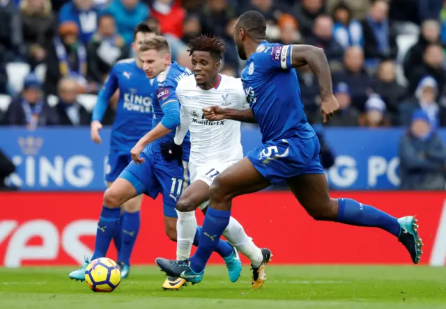 WIlfried Zaha bests Leicester defenders