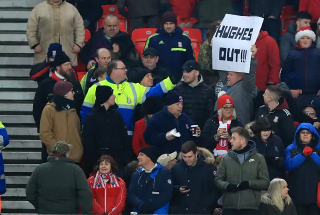 Mark Hughes banner held by fan