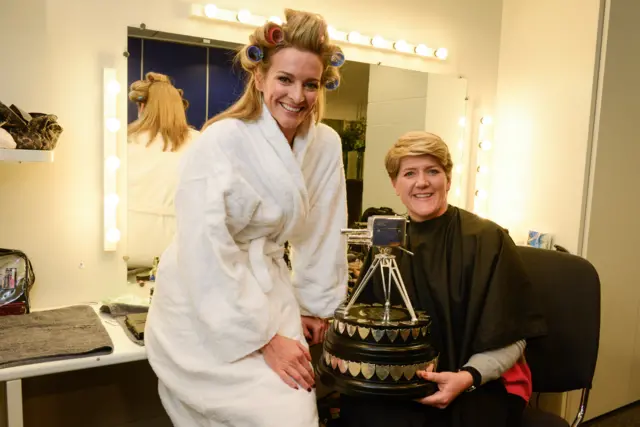 Gabby Logan and Clare Balding in the dressing room with the Sports Personality trophy