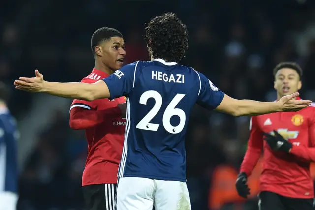 Ahmed Hegazi and Marcus Rashford