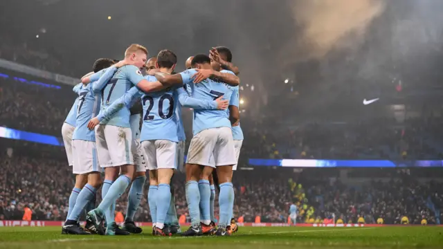 Manchester City players celebrate