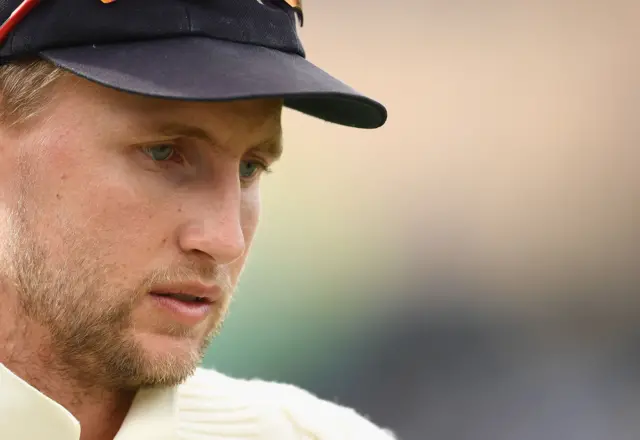 Joe Root of England looks on