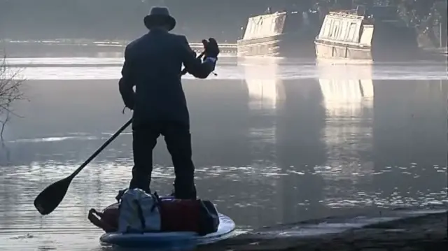 Kevin Bell on his paddle board