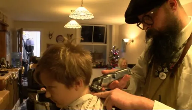 Jools getting his head shaved