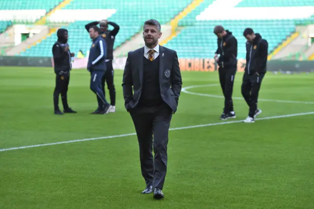 Motherwell boss Stephen Robinson on the pitch before kick-off at Celtic Park