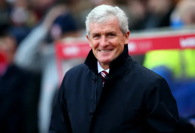 Mark Hughes smiles