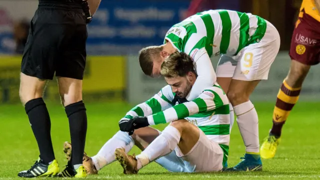 Celtic's Patrick Roberts is consoled by Leigh Griffiths