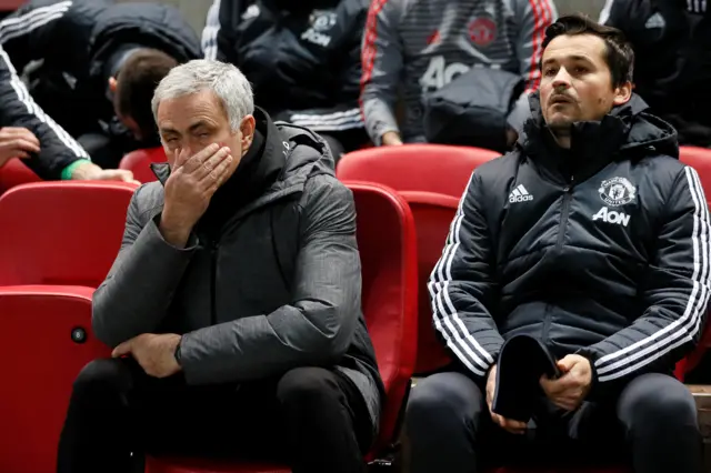 Jose Mourinho watches on