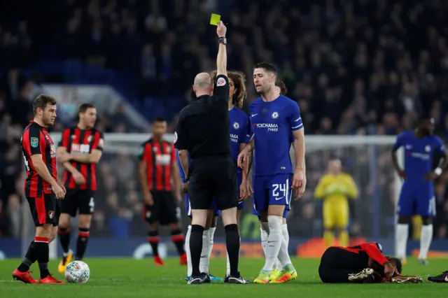 Ethan Ampadu receives a yellow card