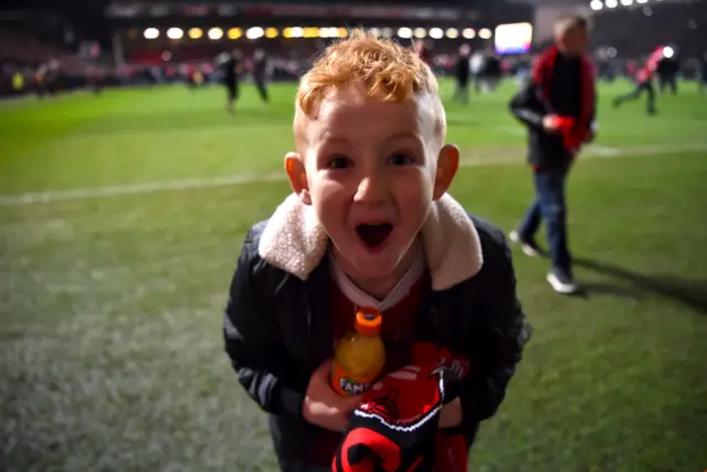 The Bristol City fans celebrate after the final whistle