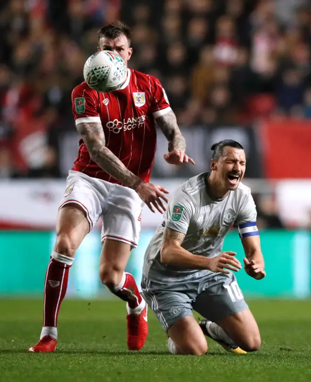 Zlatan Ibrahimovic is fouled by Aden Flint