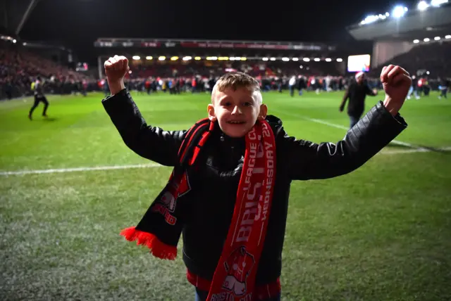 The Bristol City fans celebrate after the final whistle