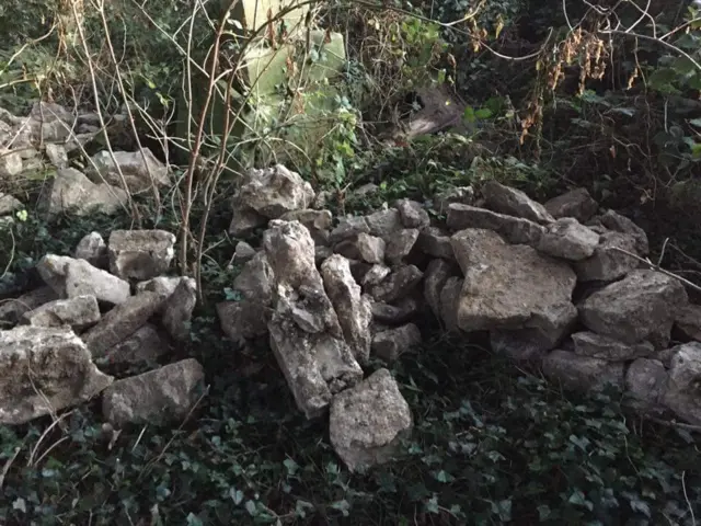 Rubble on grave