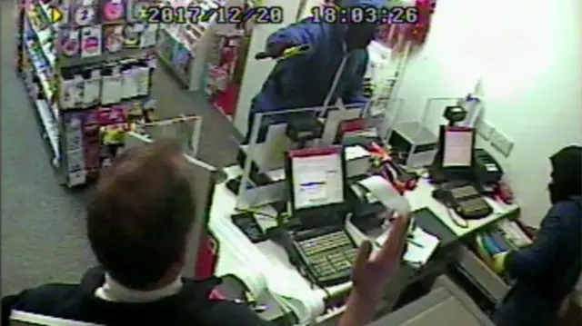 Axe-wielding robbers attack post office