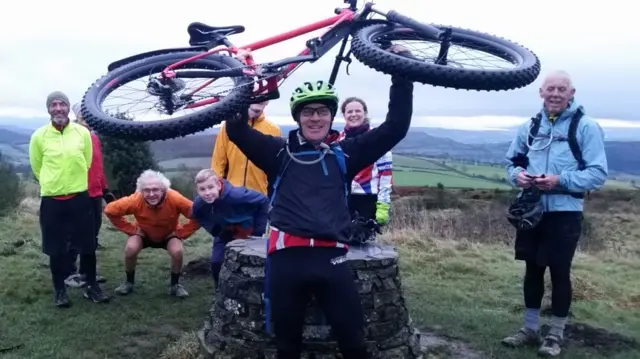 Paul Rogers and group at top of Bury Ditches