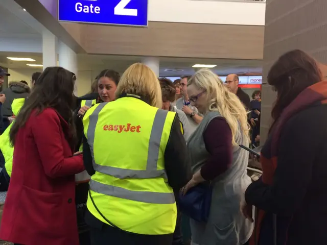 Easyjet representatives trying to help travellers