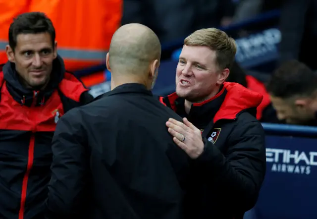 Eddie Howe and Pep Guardiola shake hands